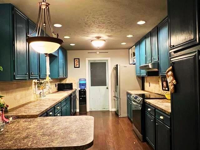 Property Photo:  1305 Hancock St  KS 67801 