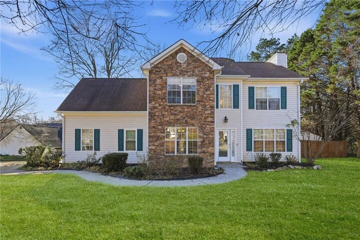 Property Photo:  7140 Hunters Trace Drive  GA 30028 