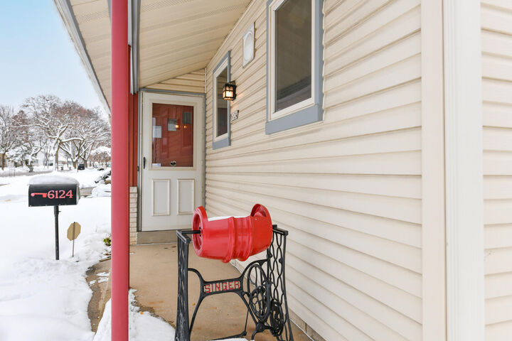Property Photo:  6124 W Spokane St  WI 53223 