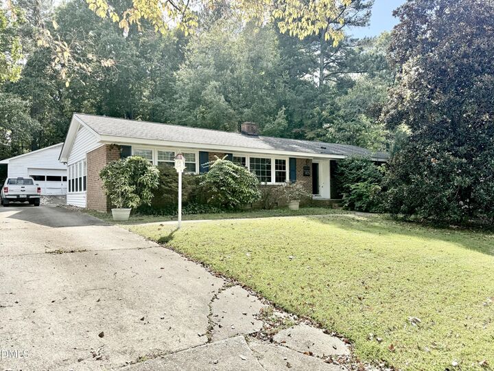 Property Photo:  204 Meadow Drive  NC 27511 