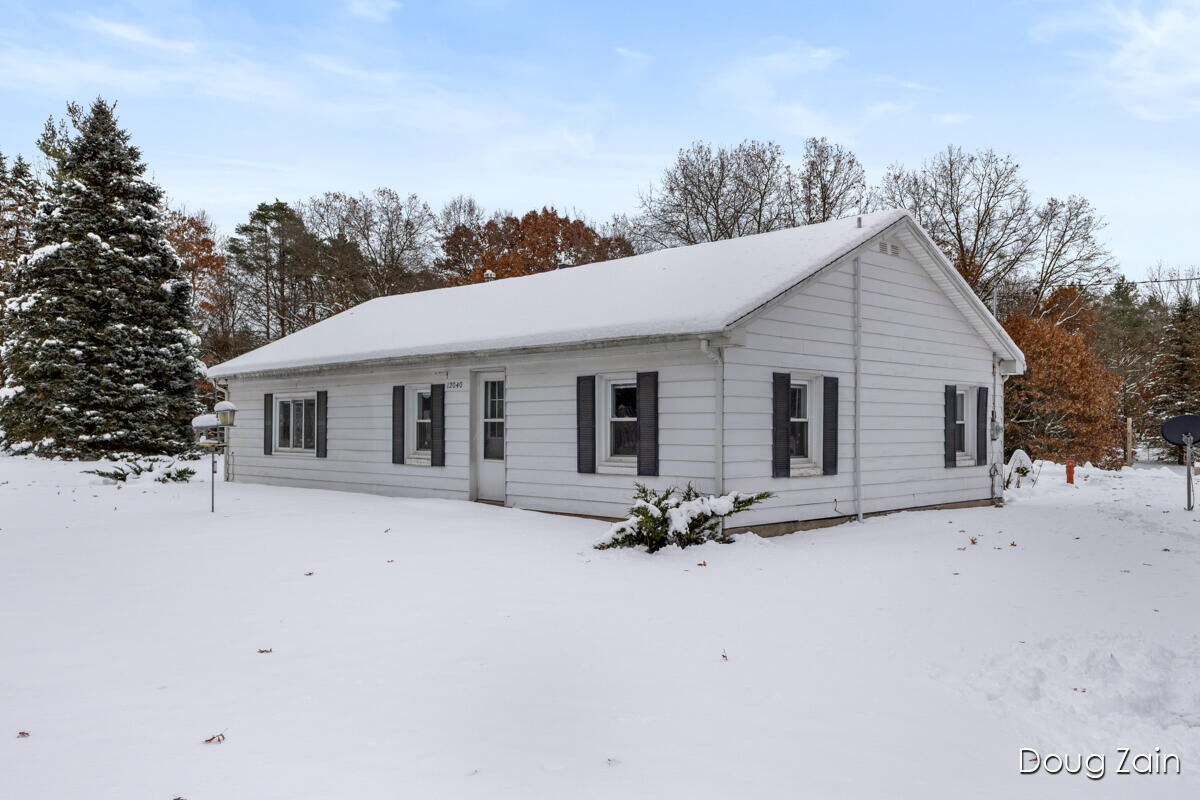 Property Photo:  12040 Macclain Street NE  MI 49319 