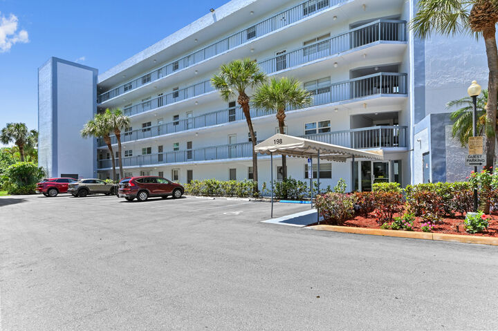 Property Photo:  198 NW 67th Street 207  FL 33487 