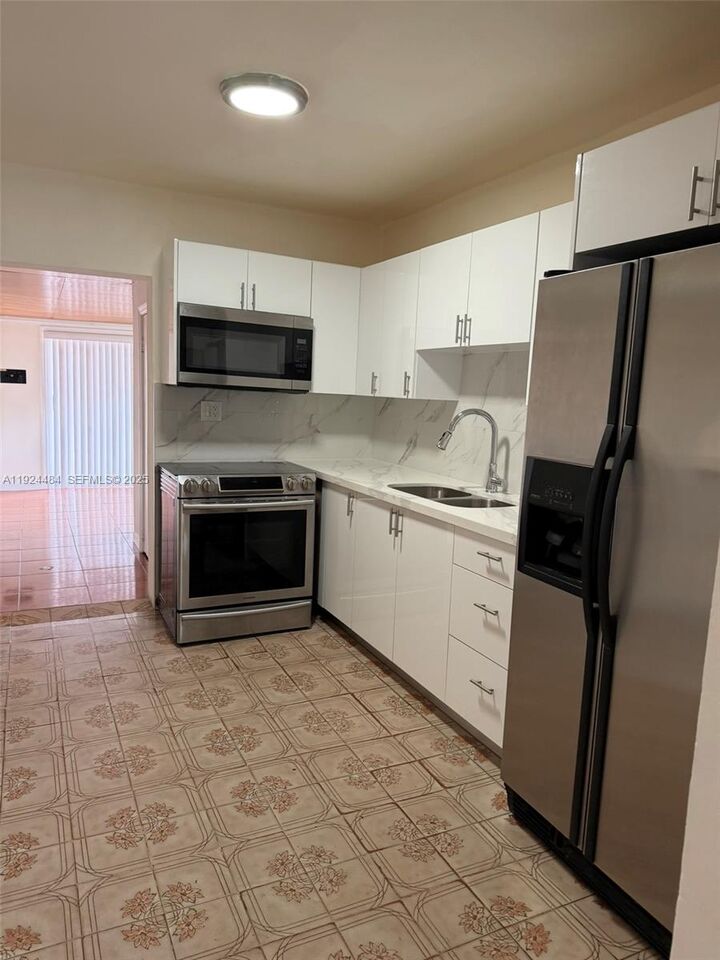 Property Photo:  791 E 21st St  FL 33013 