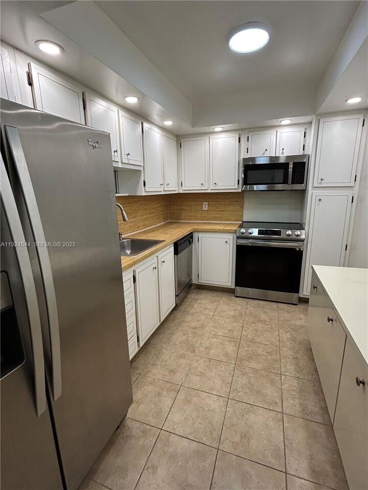 Property Photo: 1100 Saint Charles Pl 308 FL 33026