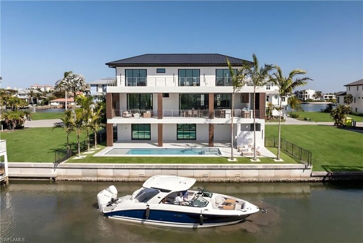 Property Photo: 256 Trade Winds Ave FL 34108