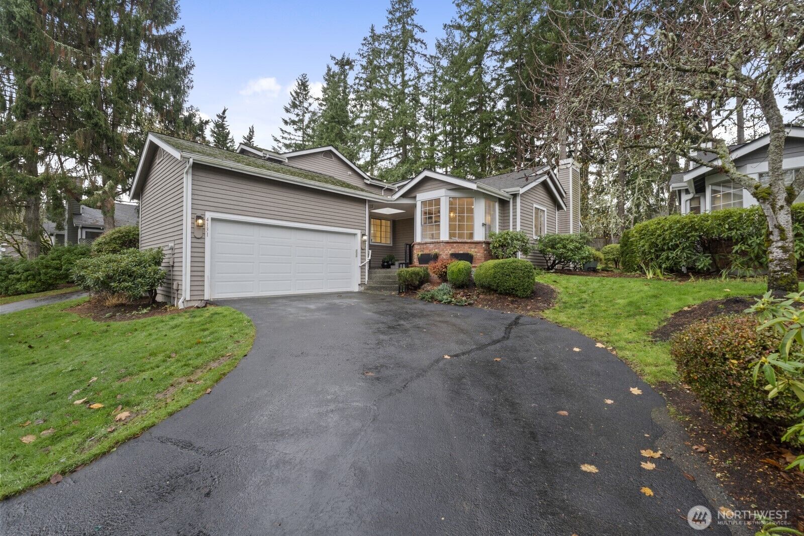Property Photo:  4131  243rd Lane SE 18  WA 98029 