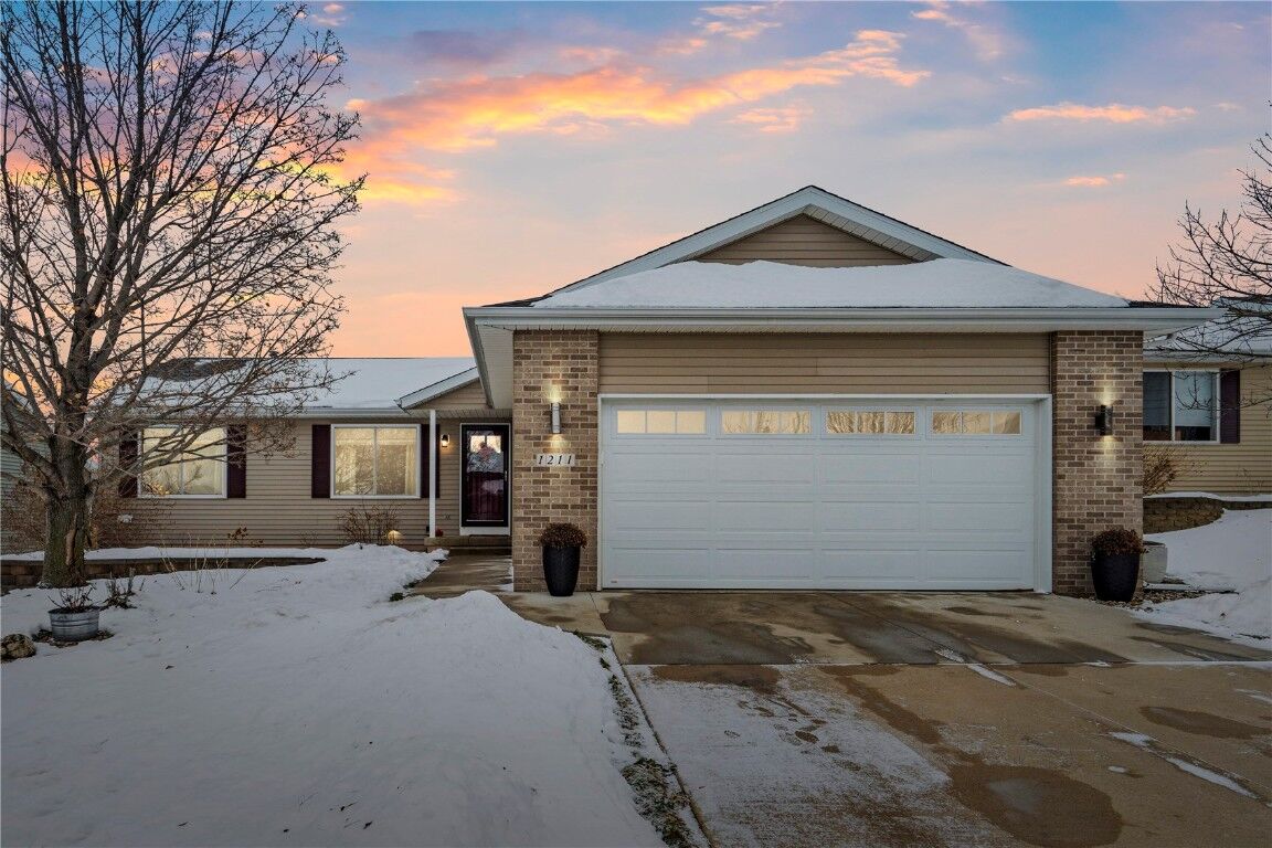 Property Photo: 1211 Wolf Dr NW IA 52405