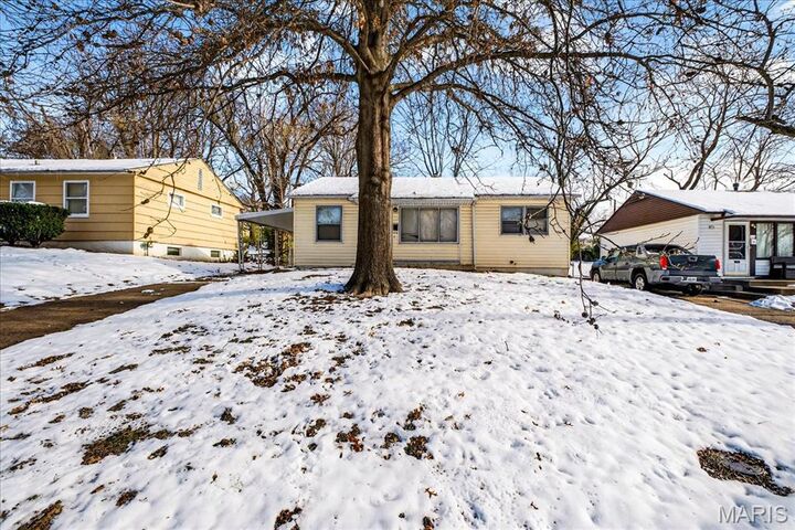 Property Photo:  9746 Millburn Drive  MO 63136 