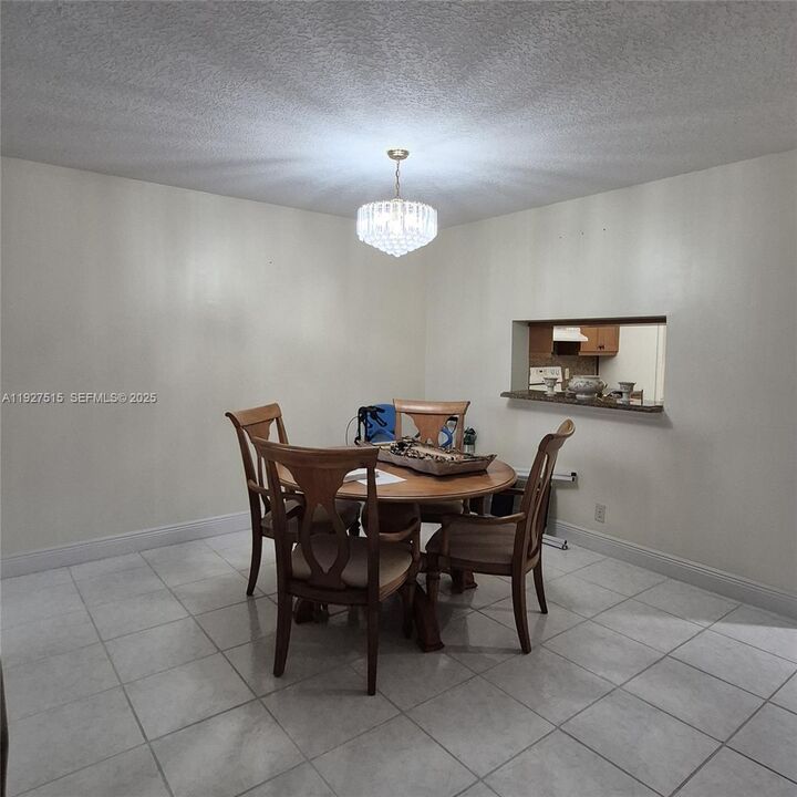 Property Photo: 901 SW 128th Ter 208A FL 33027
