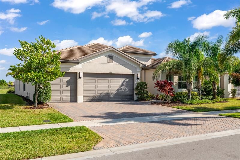 Property Photo: 11965 SW Sandy Bay Cir FL 34987