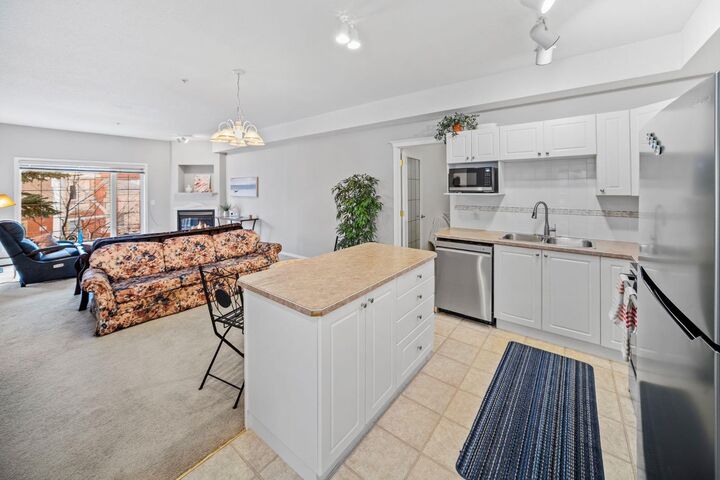 Property Photo:  223 Tuscany Springs Boulevard NW 201  AB T3L 2M2 