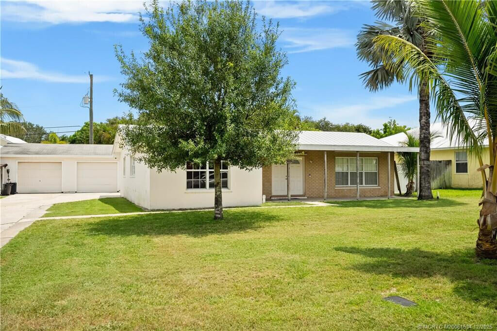 Property Photo:  9035 SE Athena Street  FL 33455 