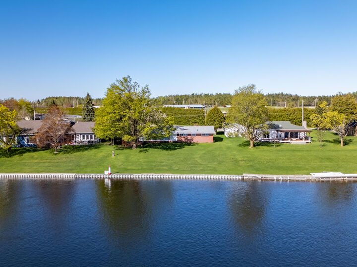 Property Photo:  190 Riverside Drive  MI 49721 