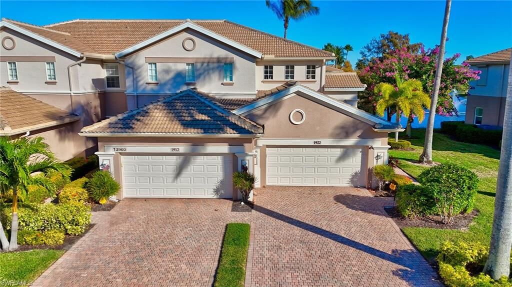 Property Photo: 13960 Lake Mahogany Blvd 1922 FL 33907