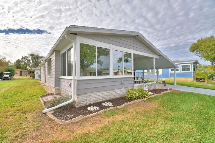 Property Photo:  4911 Colonnades Club Boulevard  FL 33811 