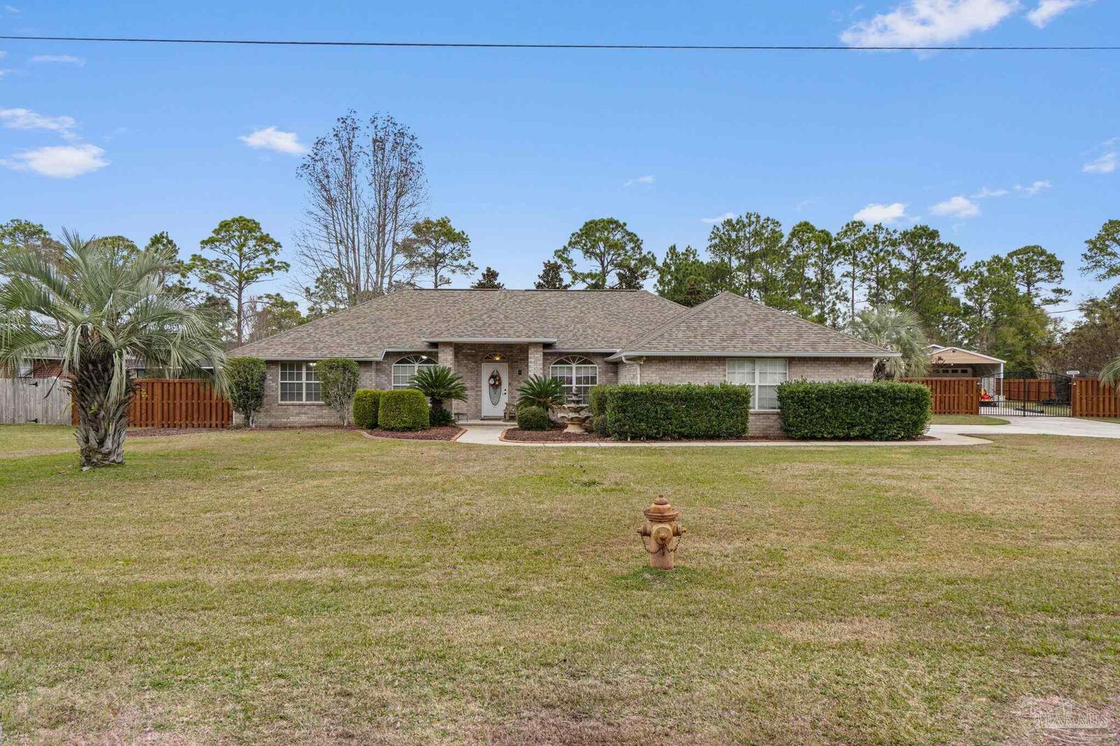 Property Photo:  5692 Als Way  FL 32583 