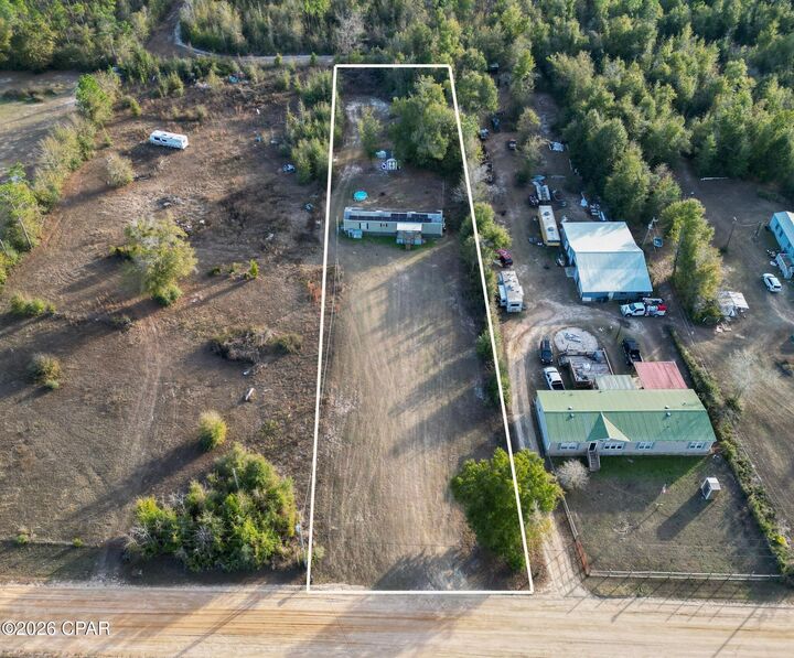 Property Photo:  10626 Happyville Road  FL 32466 