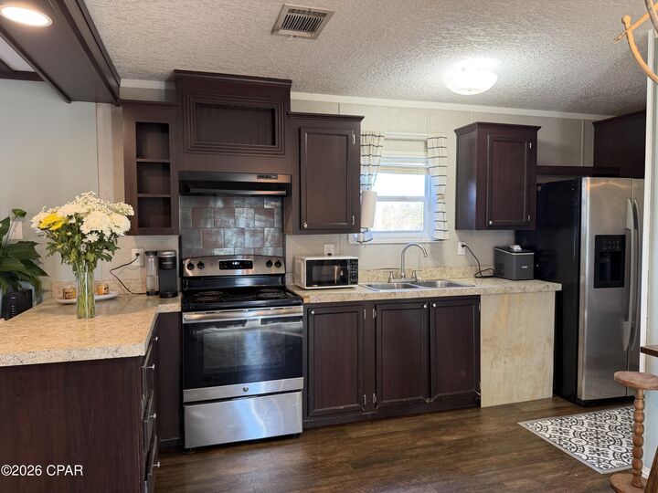 Property Photo:  10626 Happyville Road  FL 32466 