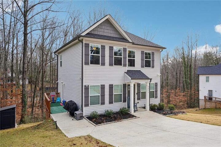 Property Photo:  4975 Wisdom Road  GA 30041 