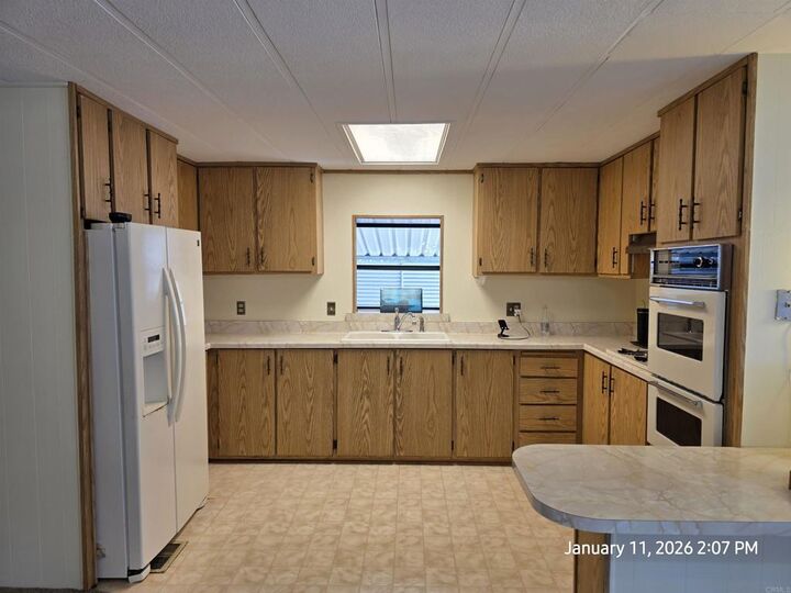 Property Photo: 8712 N Magnolia Avenue Spc 65 CA 92071