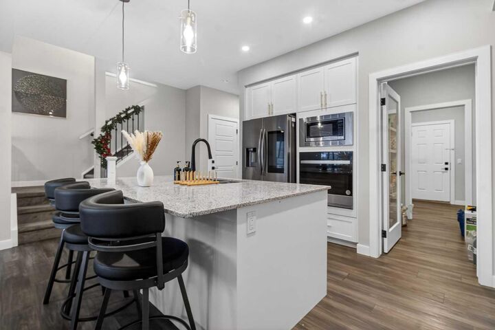 Property Photo: 66 Belmont Manor SW AB T2X 5E4