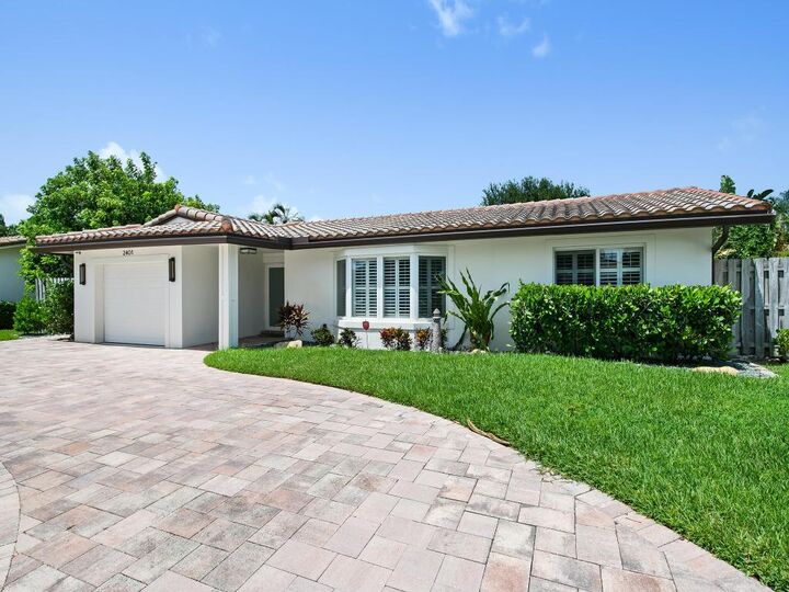 Property Photo:  2401 NE 45th Street  FL 33064 