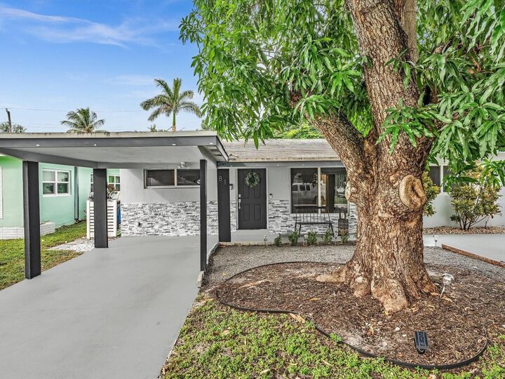 Property Photo:  81 NW 47th Court  FL 33309 