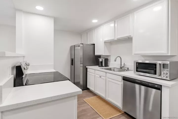 Property Photo:  1810 S El Camino Real 101  CA 92024 