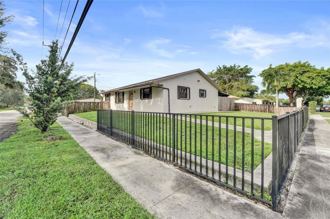 Property Photo:  7400 Raleigh Street  FL 33024 