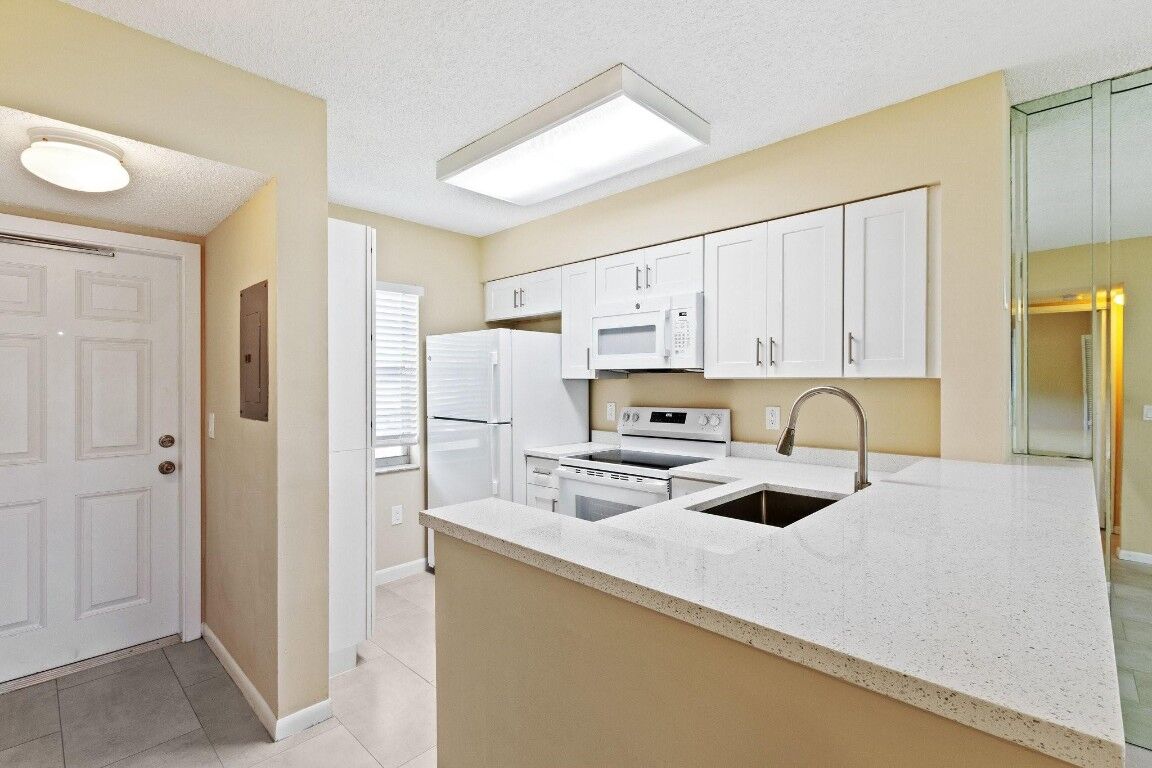 Property Photo:  2236 N Cypress Bend Drive 112  FL 33069 