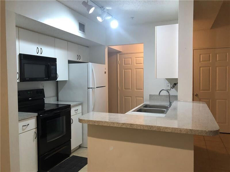 Property Photo:  3874 Lyons Road 304  FL 33073 