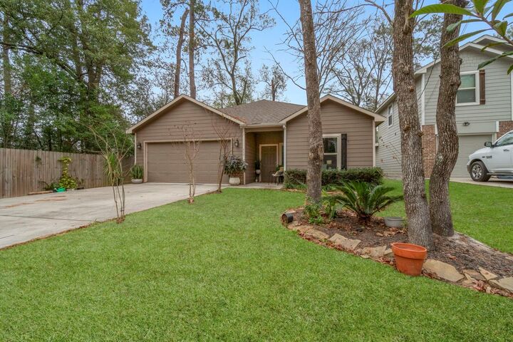 Property Photo:  517 Chickasaw Drive  TX 77316 