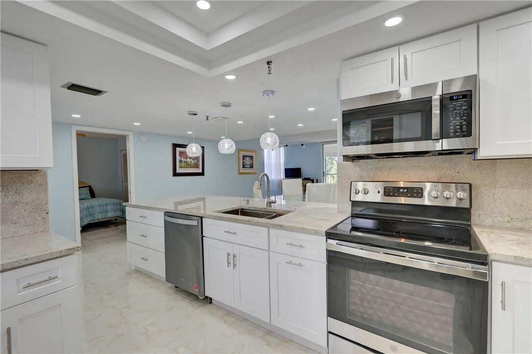 Property Photo:  198 NW 67th Street 205  FL 33487 