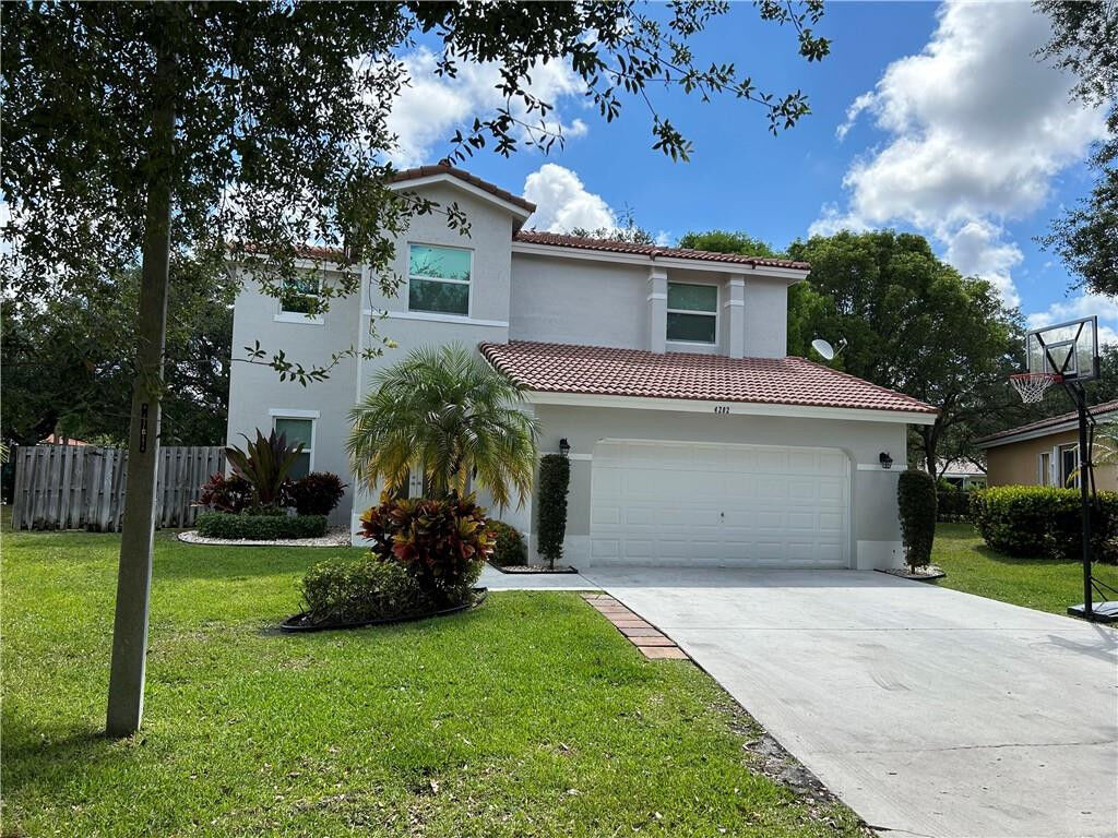 Property Photo:  4202 NW 43rd Way  FL 33073 