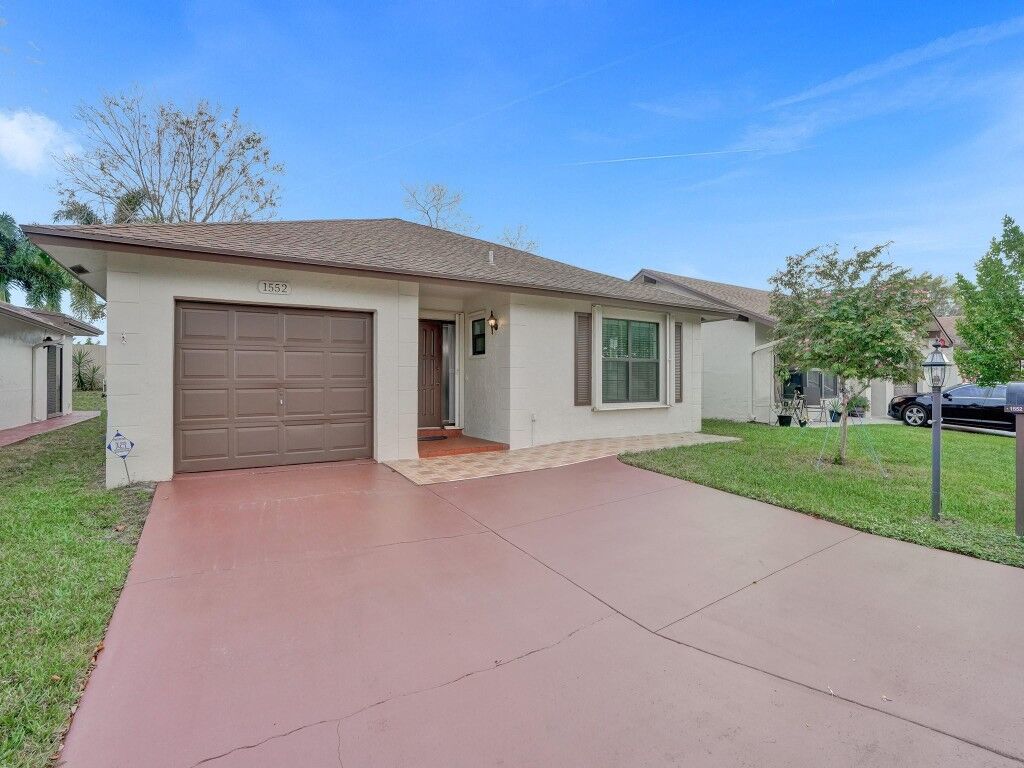 Property Photo:  1552 SW 19th Avenue  FL 33442 