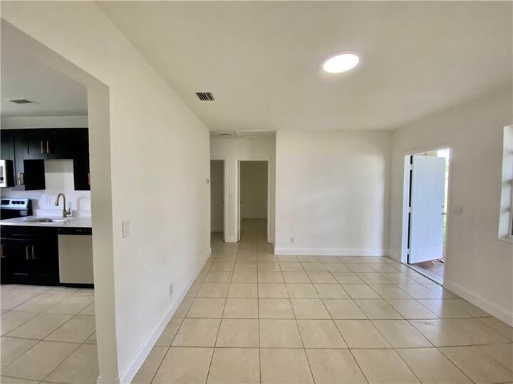 Property Photo:  721 NW 1st Court  FL 33009 