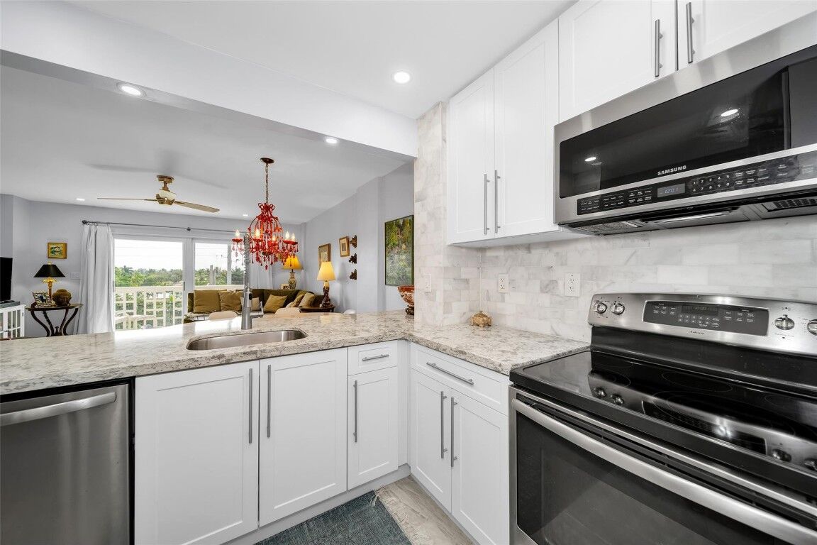 Property Photo:  1831 NE 38th Street 402  FL 33308 