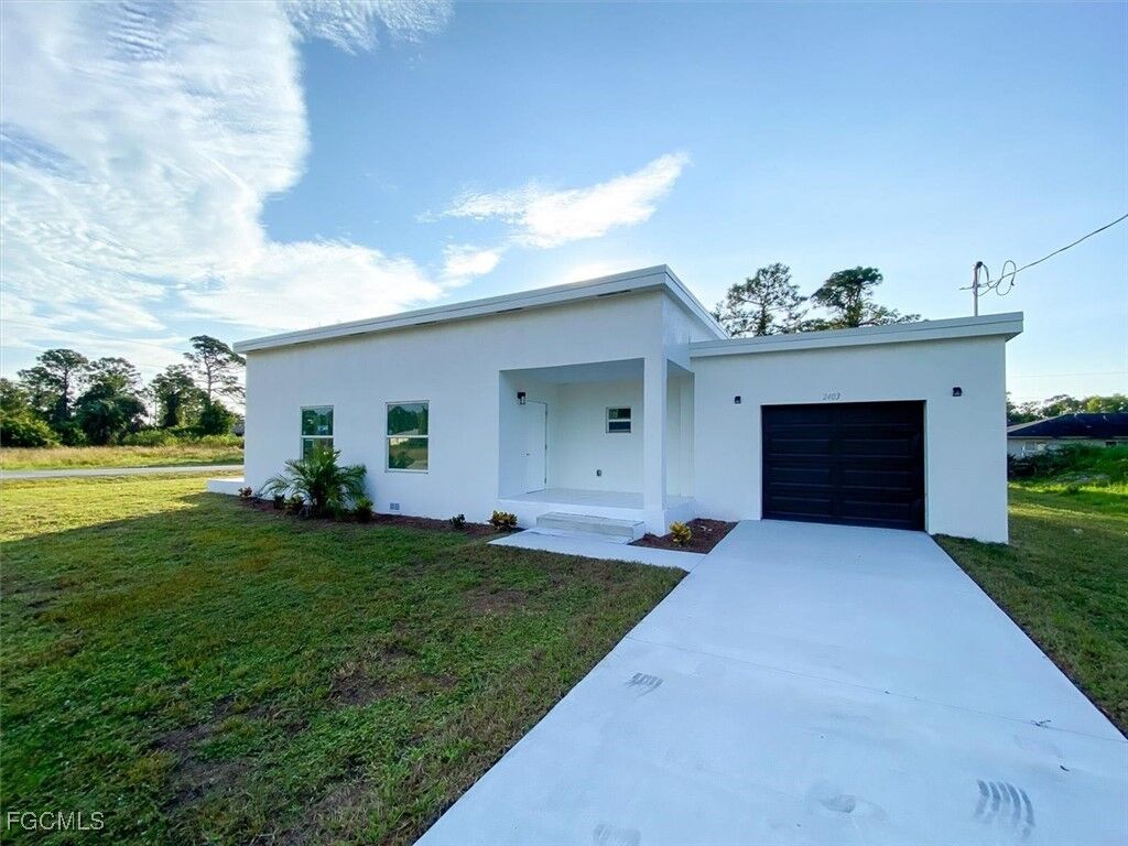Property Photo: 2401-2403 Joe Avenue S FL 33973