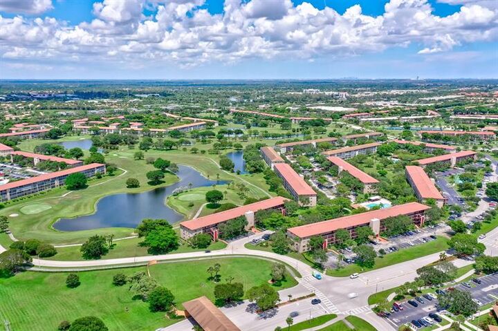 Property Photo:  300 SW 134th Way 204E  FL 33027 