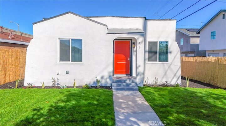 Property Photo:  317 W 107th  CA 90003 