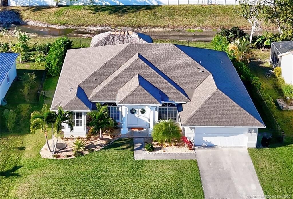 Property Photo:  2449 SW Angus Avenue  FL 34953 