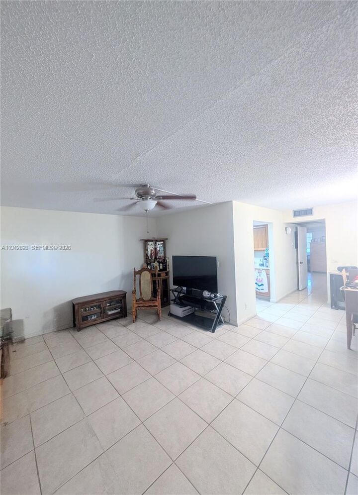 Property Photo:  850 SW 133rd Ter 104B  FL 33027 