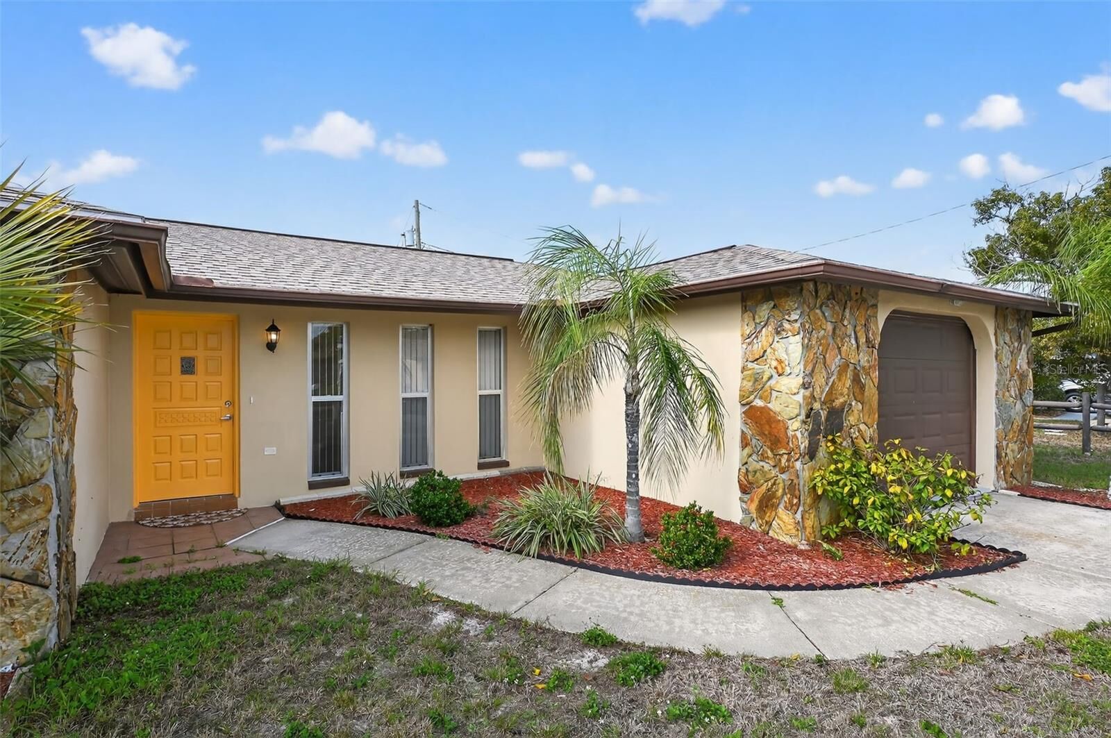 Property Photo: 1037 Tamarac Drive FL 34690