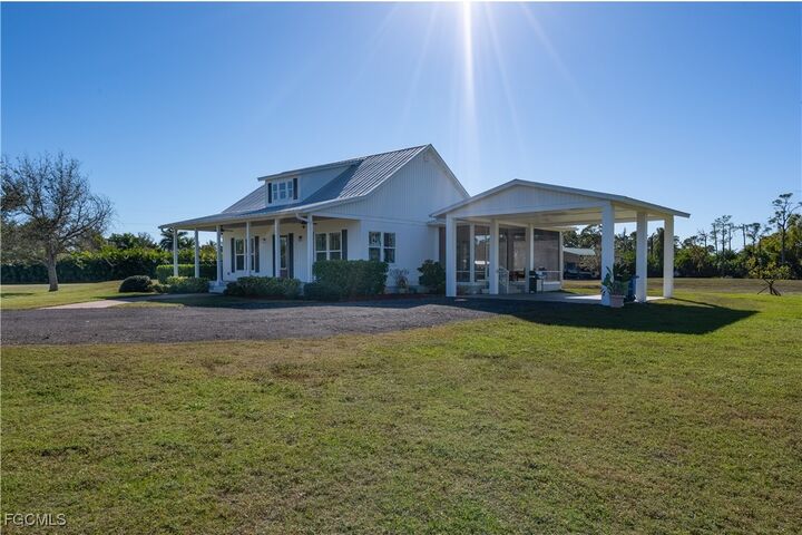 Property Photo:  4093 Sunshine Boulevard  FL 33956 