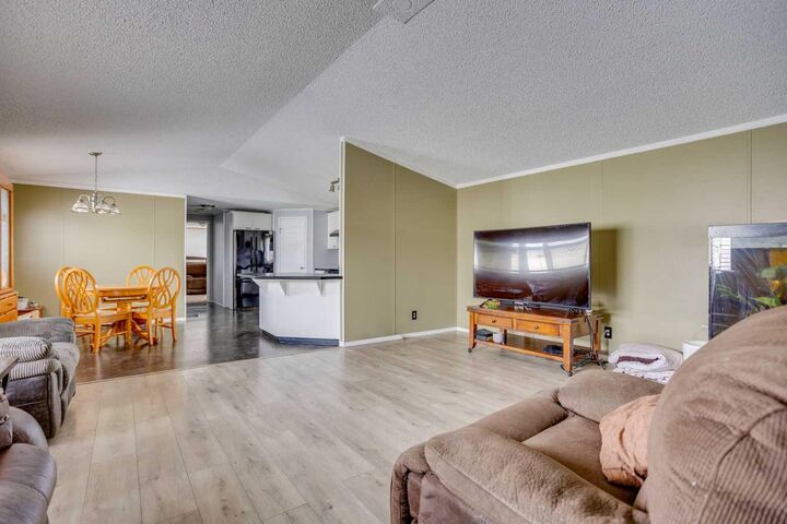 Property Photo: 209 Waterhouse Street AB T9K 2T1