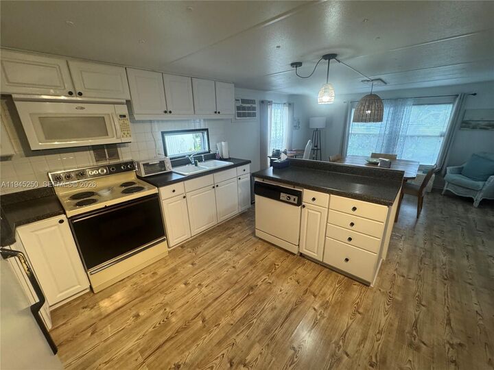 Property Photo:  231 W Lake Dr .  FL 33009 