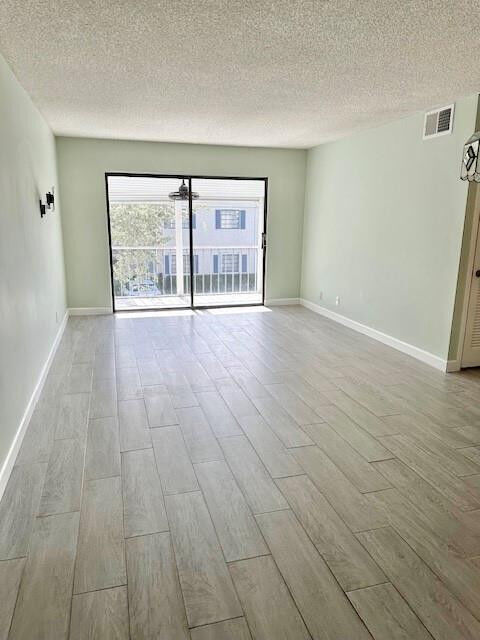 Property Photo: 130 Cypress Club Drive 323 FL 33060