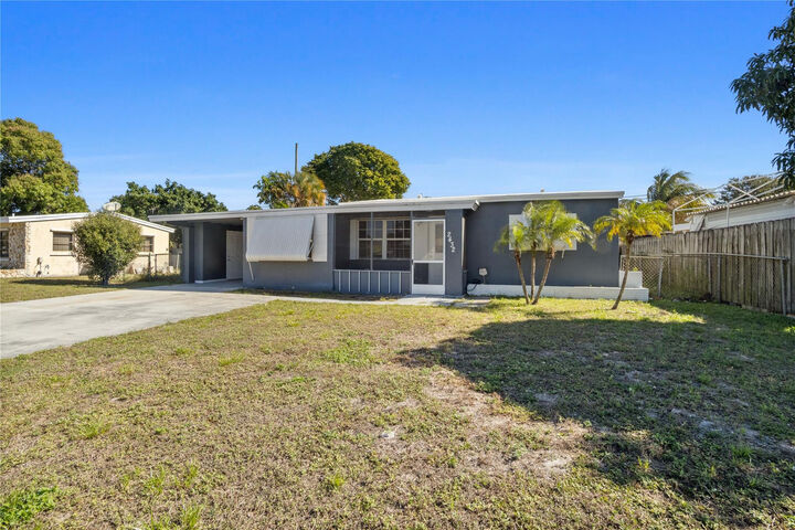 Property Photo:  2432 NE 13th Avenue  FL 33064 