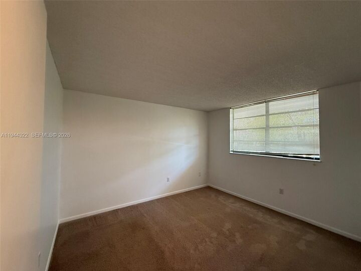 Property Photo:  1000 Colony Point Cir 303  FL 33026 