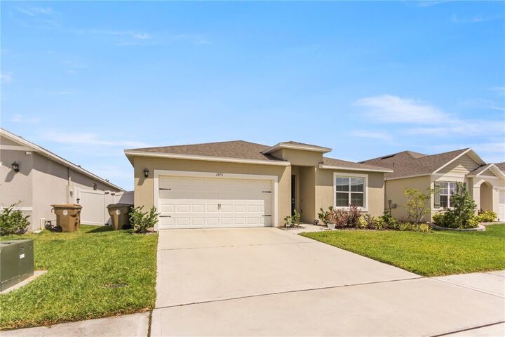 Property Photo:  1975 Cacutta Way  FL 34744 